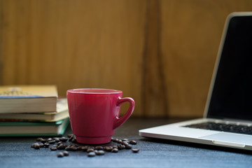 Cup coffee on working desk.