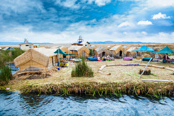Uros floating islands on Titicaca lake in Puno, Peru, South America.