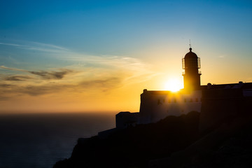 Fototapeta na wymiar Lighthouse of Cabo Sao Vicente, Sagres, Portugal at Sunset - Farol do Cabo Sao Vicente 