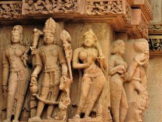 Erotic sculptures and sex poses of man in kajuraho temples, Madhya Pradesh, India. Built around 1050, it is a UNESCO world heritage site, a tourist destination. The concept of textures and postcards.