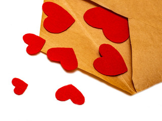 Red hearts fly out of an envelope, on a white background. love message. Valentine's Day.