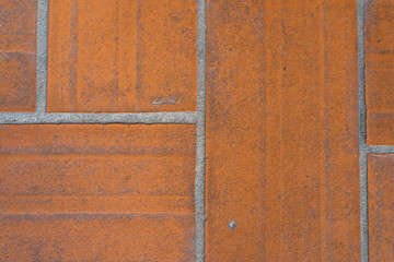Orange tiled floor background.