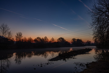 Sunset and Sunrise on a small lake