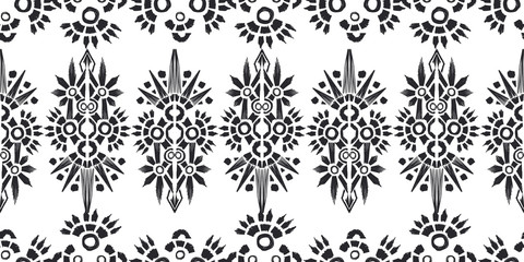 Ikat pattern etnic indian ornamental black and white illustration. Navajo motif texture ornate  design for surface print. Black and white background.