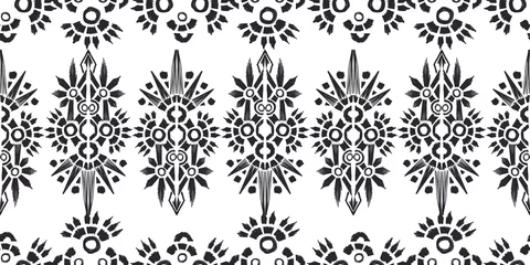 Fototapete Ikat pattern etnic indian ornamental black and white illustration. Navajo motif texture ornate  design for surface print. Black and white background. © WI-tuss