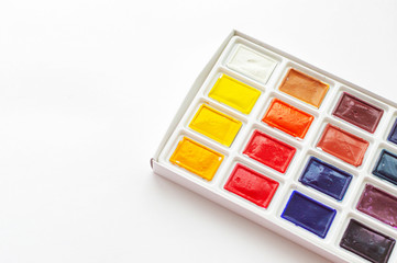 watercolor paints on a white background. Art workshop, art school.