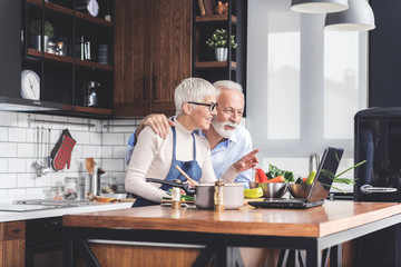 Senior couple in kitchen