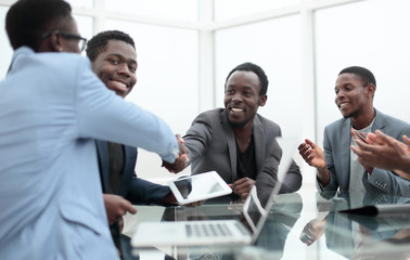 business people greeting each other during a working meeting.