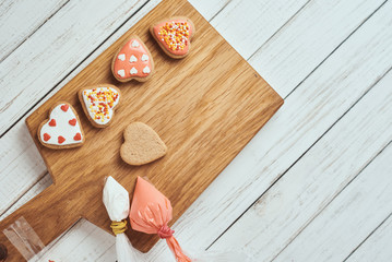 Decorated gingerbread cookies with icing on the table