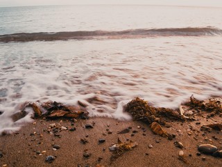 Photo of the shore and the waves after the storm