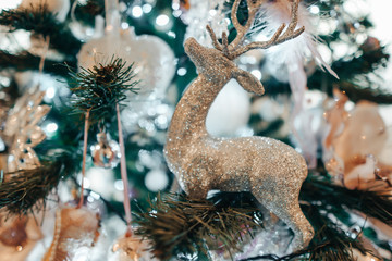 Decorated Christmas tree on background.