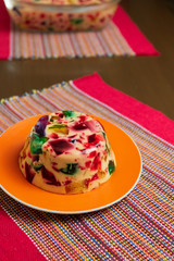 Gelatin in colors, sweet very famous in Brazil. Brazilian candy on the wood table kitchen