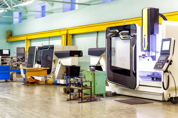 Vertical machining center 3 axis universal milling. Industrial equipment of cnc milling machine center in tool manufacture workshop