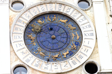 Fototapeta na wymiar Astrological clock at the Torre dell'Orologio in Venice. Astronomic clock at a tower at St. Mark's square. Clocktower an early Renaissance building of the Piazza San Marco. Zodiac Dial.