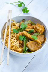 Satay pork curry with egg noodles