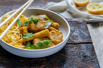 Satay pork curry with egg noodles