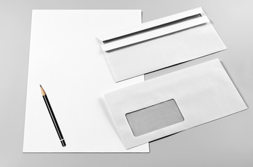Two Envelopes, Blank Sheets of Paper, and Pencil 