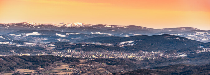 Panoramic view of winter Giant Mountains, Czech: Krkonose, from Jested Mountain. With Jablonec nad Nisou in the foreground, Czech Republic