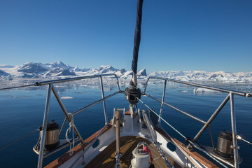 Part of yacht with icebergs landscape in Antarctica. Extreme travelling