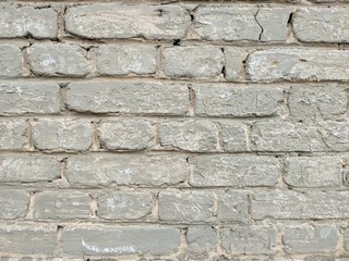 Old brick wall. The texture of a white brick wall.