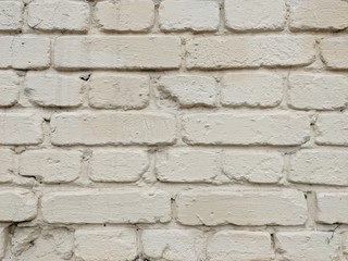 Old brick wall. Texture of a white, painted brick wall.