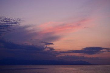 Fototapeta na wymiar Beautiful sunset by the sea in Greece