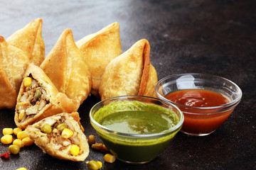 Vegetarian samsa or samosas.Indian special traditional street food fried punjabi samosa or Coxinha, Croquete and other Fried Brazilian Snacks
