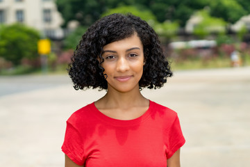 Portrait of smiling latin american woman