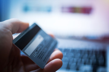 Laptop computer keyboard and credit card, online shopping, e-commerce concept