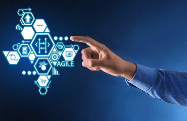 Businessman using virtual screen on color background