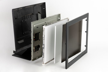 Several parts of LCD monitor, plastic frame, panel consists of polarizing filters, glass and ...