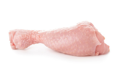 Raw chicken drumstick on white background