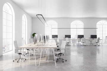 Office in white interior with computers