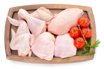 Board with raw chicken meat on white background