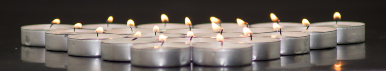 Many flaming candles