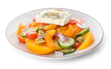Plate of tasty Greek salad on white background