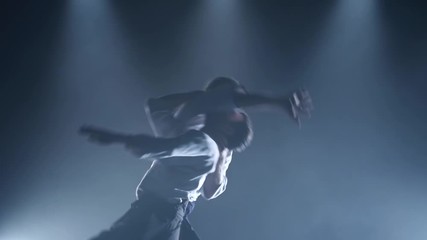 Fight between two aikido fighters in the dojo. Slow motion. Close up.