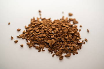 Pile of instant coffee beans isolated on white background