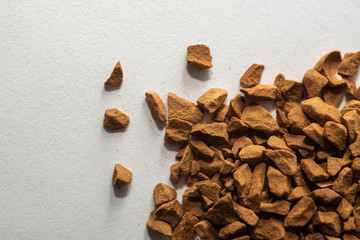 Pile of instant coffee beans isolated on white background