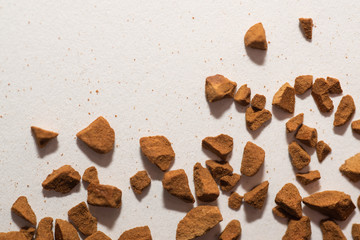 Pile of instant coffee beans isolated on white background