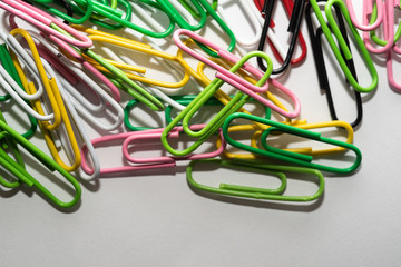 plastic paper clips on table close-up