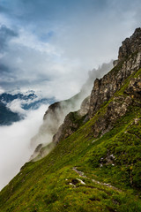 Fototapeta na wymiar mountains on a rainy day in summer with clouds and fog