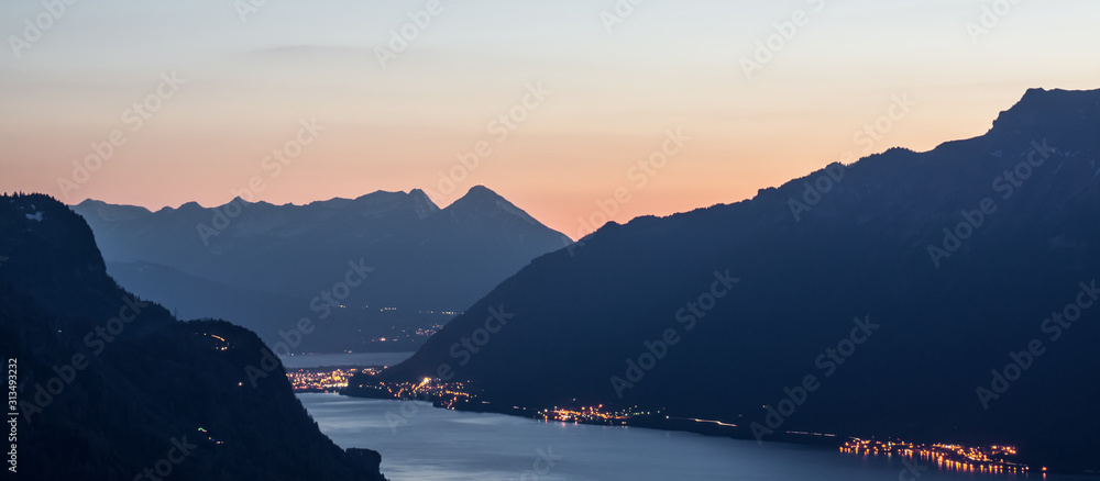 Wall mural scenic view of the swiss alps during late summer or autumn in the evening