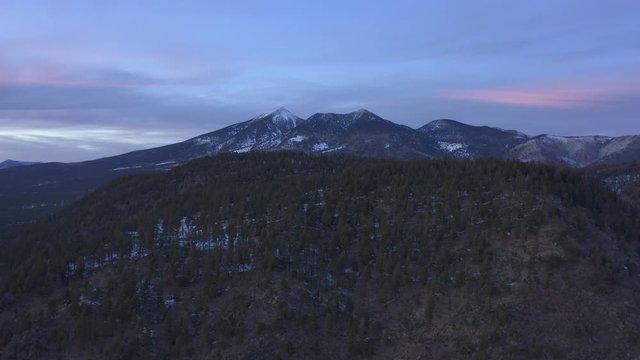 Aerial view of mount elden in Flagstaff Arizona in wintertime with snow cover