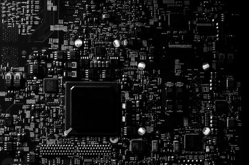 close up of small motherboard on dark background - 313496440