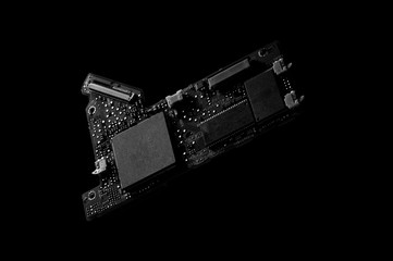 detail of small circuit board on dark background