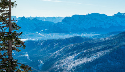 Mountain View from a Bavarian Top Point to the surrounding alp scenery during winter