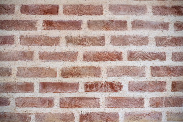 Fototapeta premium Background, wall of the house, brick made of stone. Backdrop. red.