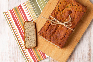 Loaf Of Banana Bread On Cutting Board