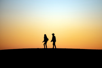 Two People Walking